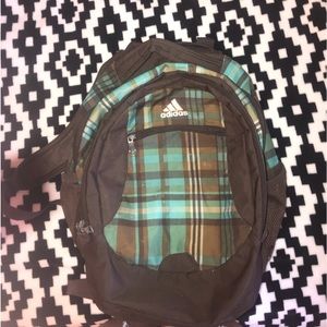 Adidas’s green plaid backpack